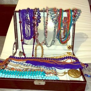 A lot of jewelry and jewelry box